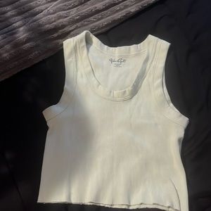 Medium light greenish/yellow crop top tank top.